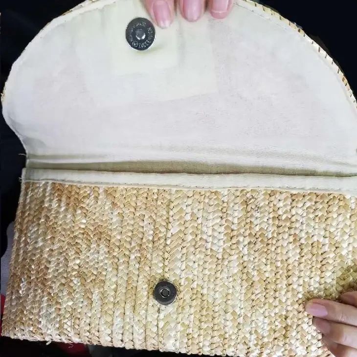 The Vineyard Straw Clutch with Interchangeable Bow in Black